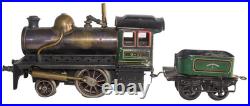 1910's Bing 1-gauge Steam Stork Leg Locomotive Passenger Set with Station platform
