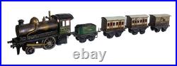 1910's Bing 1-gauge Steam Stork Leg Locomotive Passenger Set with Station platform
