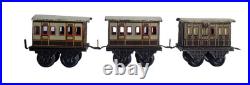 1910's Bing 1-gauge Steam Stork Leg Locomotive Passenger Set with Station platform
