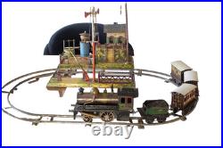 1910's Bing 1-gauge Steam Stork Leg Locomotive Passenger Set with Station platform