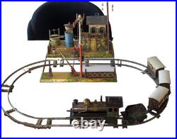 1910's Bing 1-gauge Steam Stork Leg Locomotive Passenger Set with Station platform
